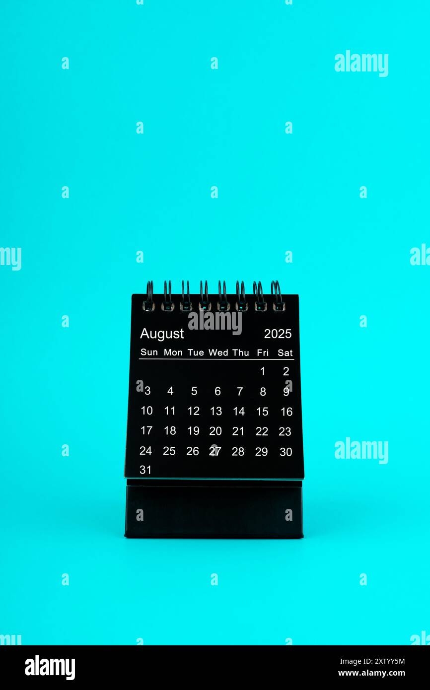 Black Calendar For August 2025 Desktop Calendar On A Green Color 